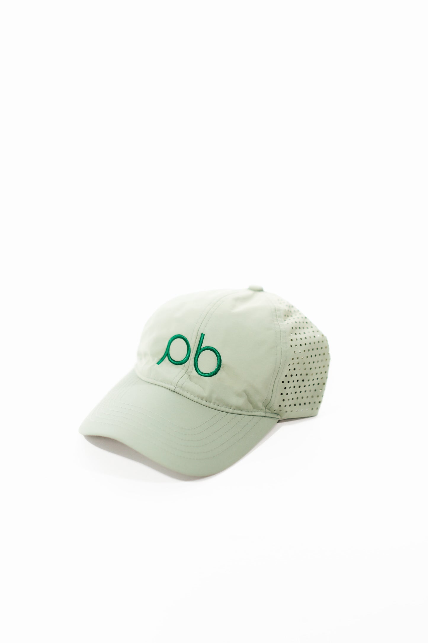 Light green hat with green "pb" logo