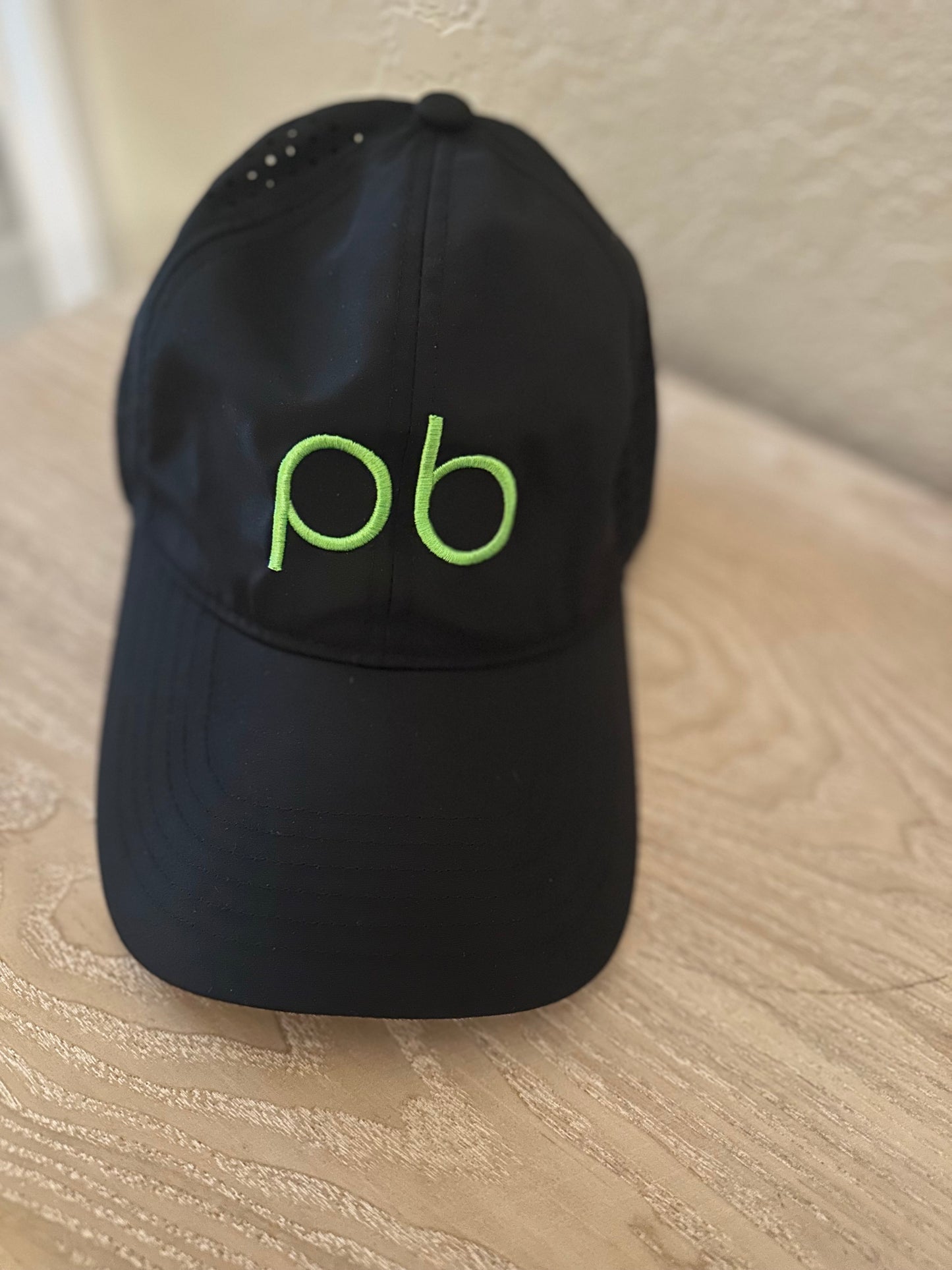 Black pb hat with Neon green logo