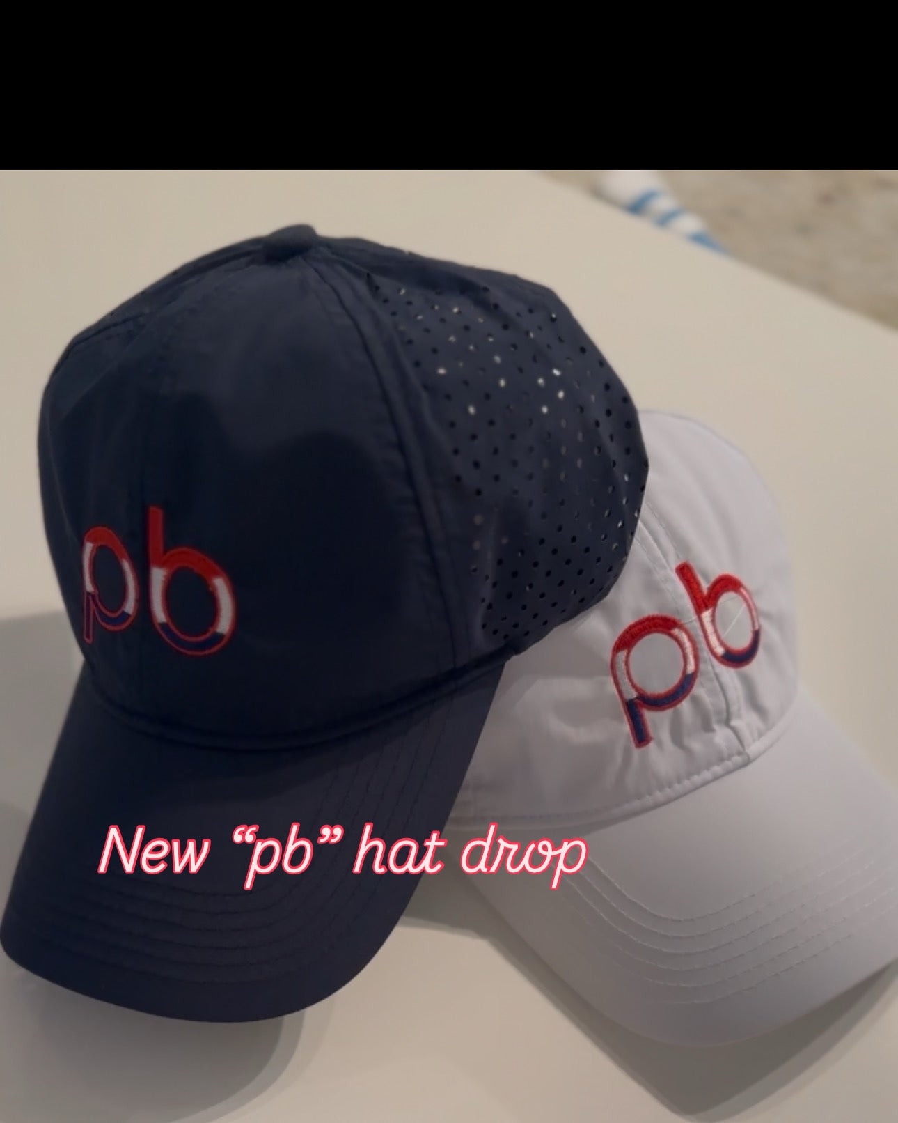 Navy Athletic hat with red, white & blue "pb logo "